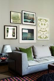 Green color scheme in a gallery wall, courtesy of House and Garden UK