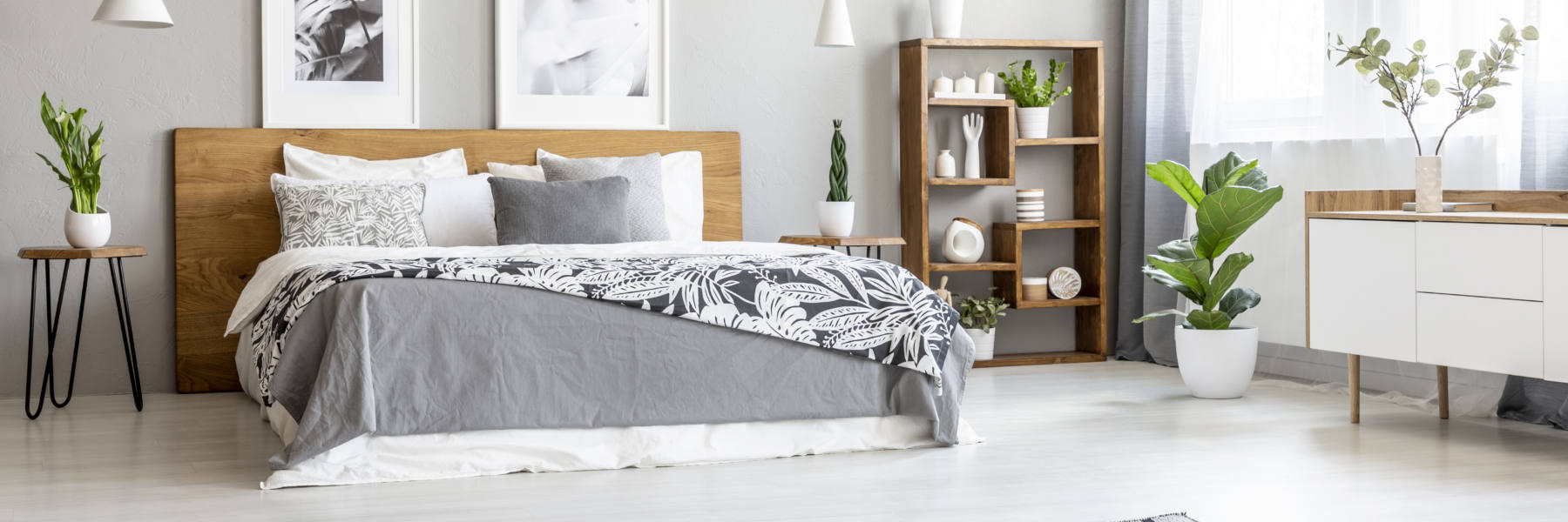 Gray neutral layered bedroom decor - photo courtesy of Bigstock
