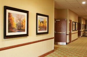 Custom picture framing display at PNW Framing in Tacoma.